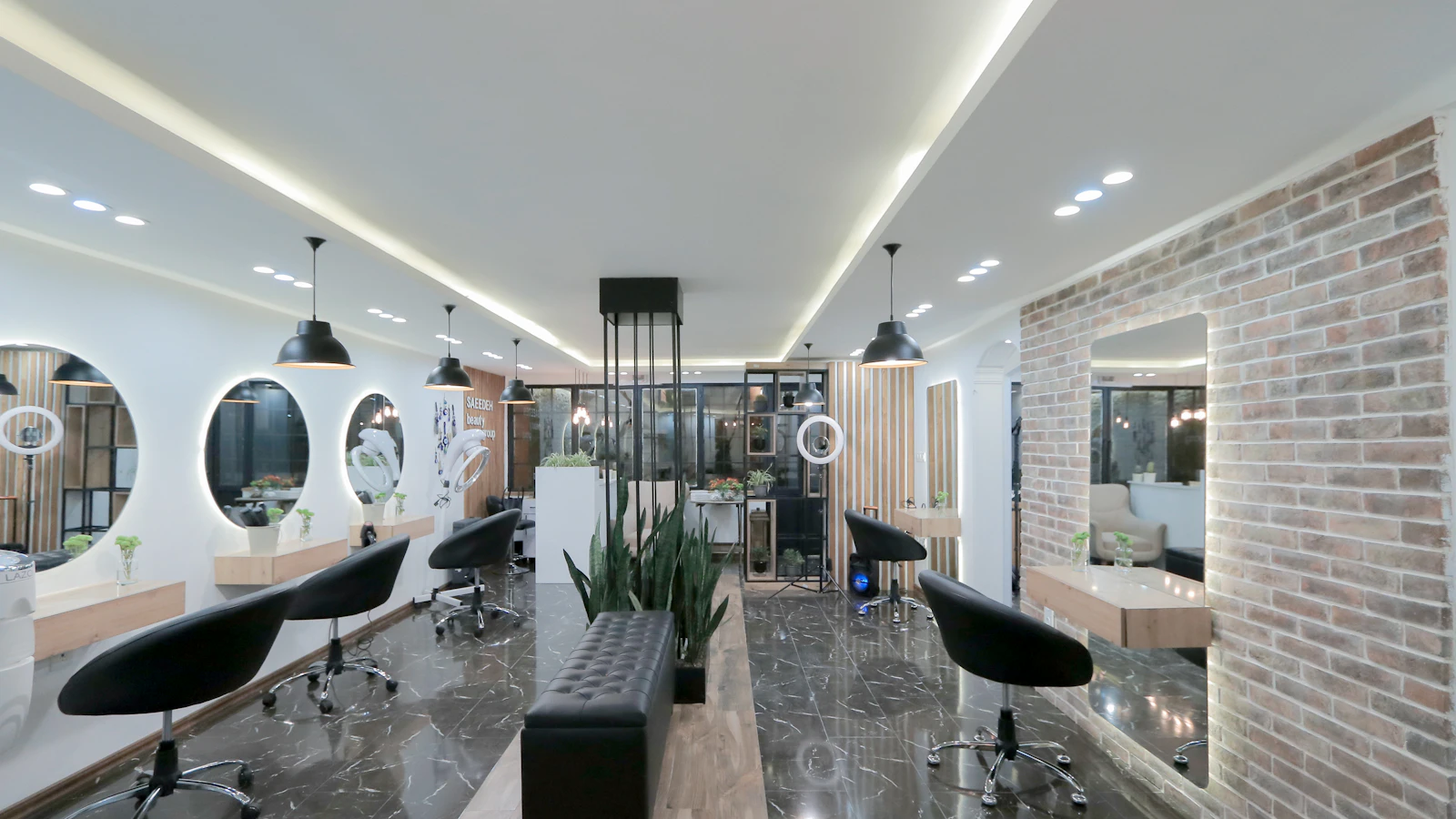 A salon set up for the day: stations, mirrors and the counter