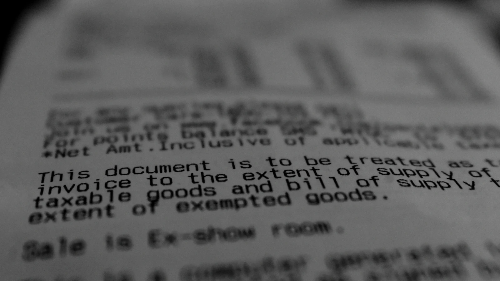 A printed receipt close up: the sales document is the one that carries the detail