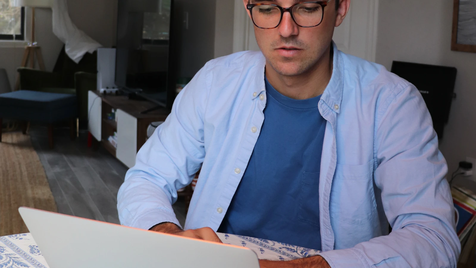 Moroccan freelancer reviewing an invoice before sending it