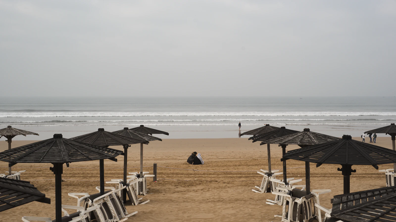 Parasols and chairs on Agadir beach facing the Atlantic